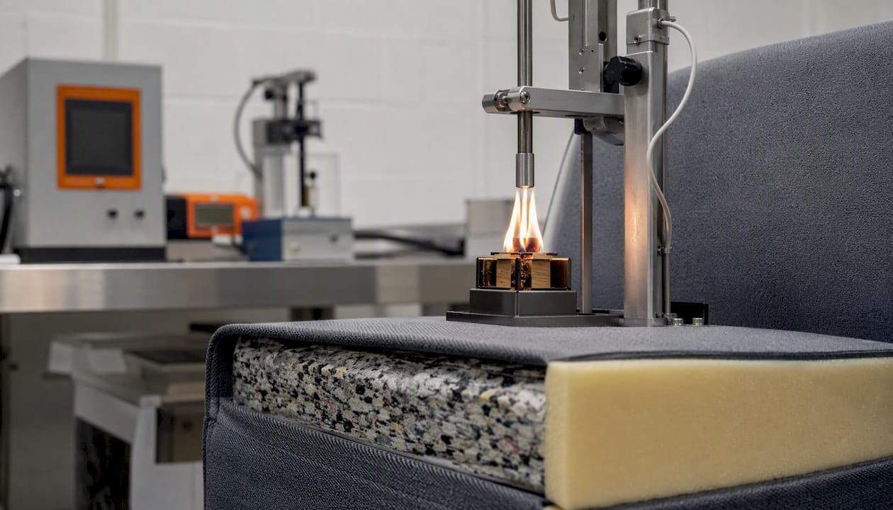 Close-up of upholstery fire safety test setup