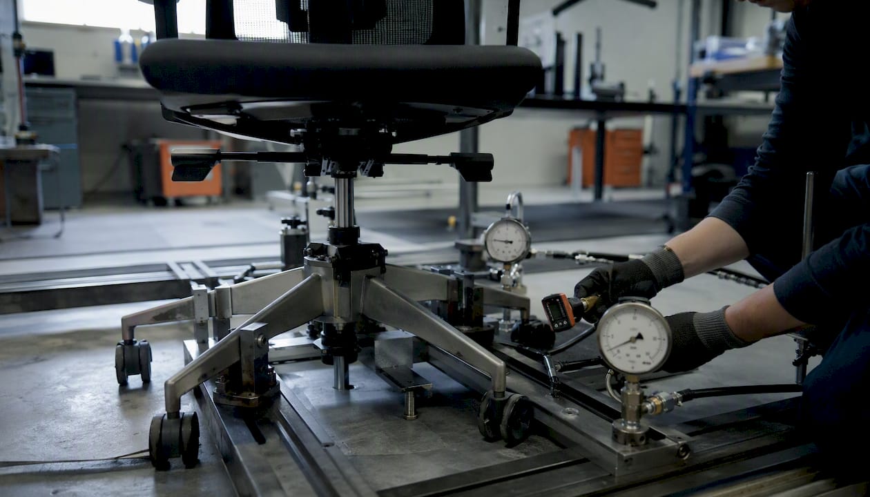 Office chair undergoing static load testing