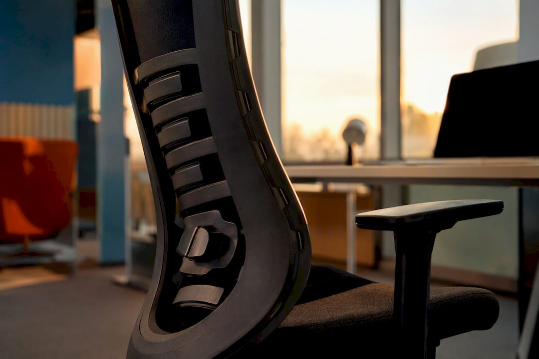 Close-up of flexible dynamic lumbar support in office chair