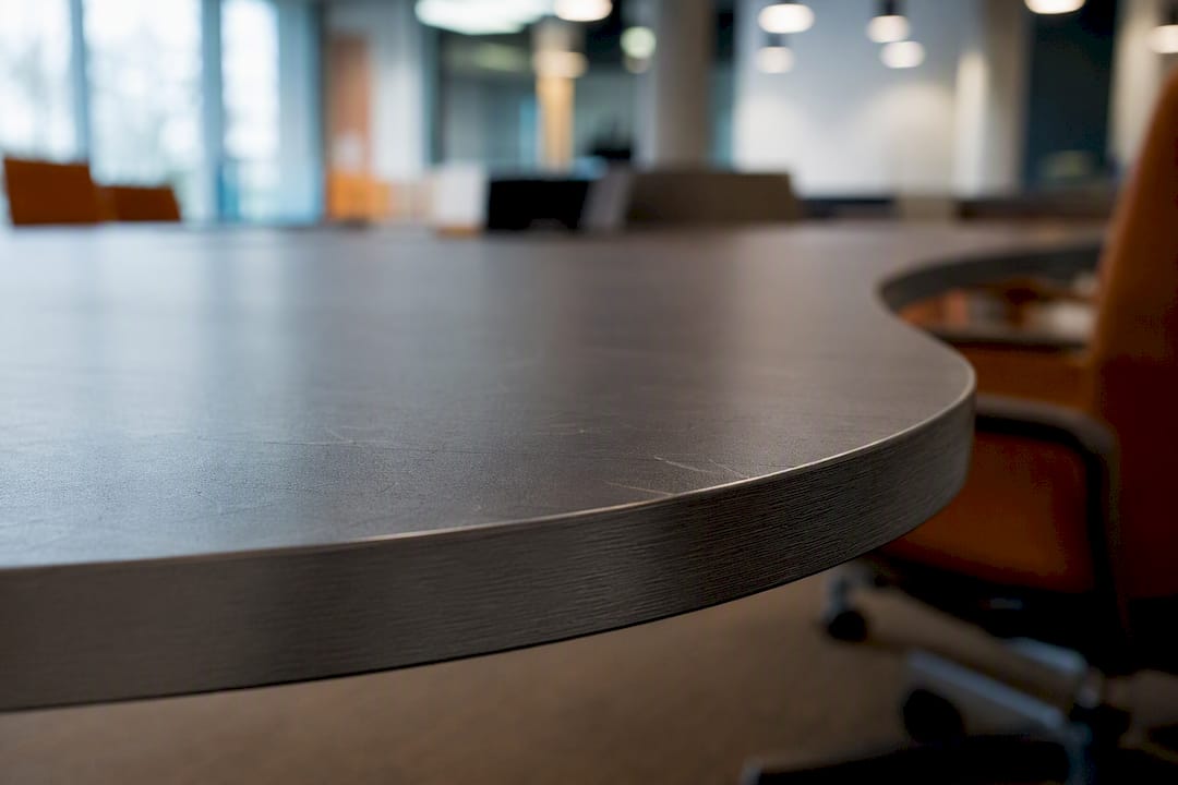 Laminate meeting table surface and sturdy edge