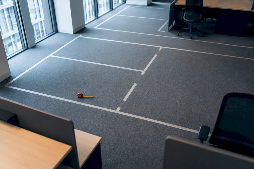 11 m³ Minimum and 150cm Capsules: UK Desk Spacing for Office Managers